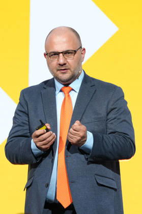 Brand Economy Day 2026: Author and speaker Stefan Kolev on stage during his keynote address at Brand Economy Day 2026, Berlin, October 8, 2026, Berlin, Berlin, Germany