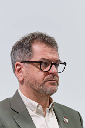 Berlin, October 8, 2026: Werner Graf of Alliance 90 The Greens looks to the side during a joint press statement by The Left Berlin, Alliance 90 The Greens Berlin, and the SPD Berlin following the conclusion of preliminary talks in the foyer of the Haus der Statistik. Press statement by The Left, The Greens, and the SPD in Berlin