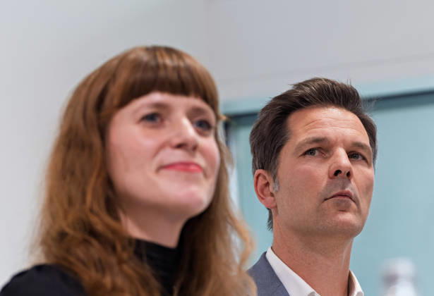 Berlin, October 8, 2026: Steffen Krach (SPD) stands next to a smiling Kerstin Wolter Ehling (Die Linke) during a joint press conference in the foyer of the Haus der Statistik following the conclusion of preliminary talks between their parties. Press conference by Die Linke, the Greens, and the SPD in Berlin