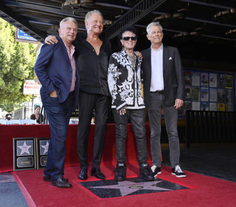 Pat Sajak, honorees Graham Russell, Russell Hitchcock and David Foster (L-R) pose during an unveiling ceremony honoring the rock duo Air Supply with the 2,859th star on the Hollywood Walk of Fame in Los Angeles on Thursday October 8, 2026. LAP2026100808 JIMxRUYMEN