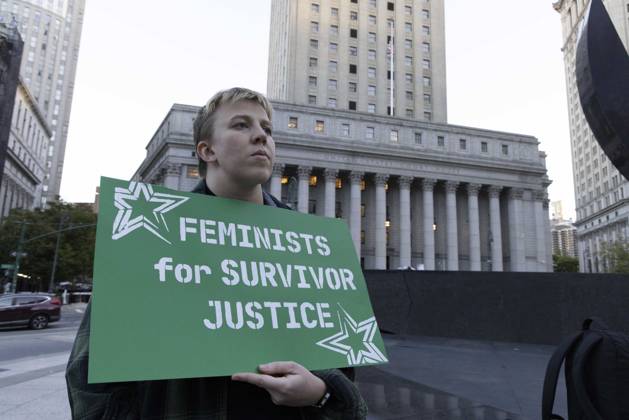 October 8, 2026, New York, New York, USA: A demonstrator holds a sign that reads FEMINISTS FOR SURVIVOR JUSTICE joining hundreds at a rally in Foley Square outside the New York State Supreme Court building in Lower Manhattan under the banner . StopSexualViolence: From the Frat House to the White House. The protest is one of many rallies and campus walkouts around the country demanding justice for Cornell s Jane Doe. New York USA - ZUMAr174 20261008_znp_r174_029 Copyright: xGinaxMxRandazzox