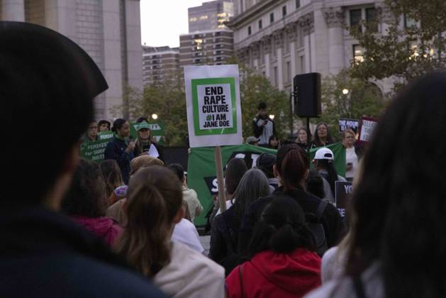 October 8, 2026, New York, New York, USA: A demonstrator holds a sign that reads END RAPE CULTURE hashtag I AM JANE DOE joining hundreds at a rally in Foley Square outside the New York State Supreme Court building in Lower Manhattan under the banner . StopSexualViolence: From the Frat House to the White House. The protest is one of many rallies and campus walkouts around the country demanding justice for Cornell s Jane Doe. New York USA - ZUMAr174 20261008_znp_r174_049 Copyright: xGinaxMxRandazzox