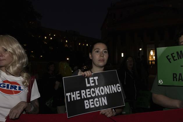 October 8, 2026, New York, New York, USA: A demonstrator holds a sign that reads LET THE RECKONING BEGIN joining hundreds at a rally in Foley Square outside the New York State Supreme Court building in Lower Manhattan under the banner . StopSexualViolence: From the Frat House to the White House. The protest is one of many rallies and campus walkouts around the country demanding justice for Cornell s Jane Doe. New York USA - ZUMAr174 20261008_znp_r174_054 Copyright: xGinaxMxRandazzox