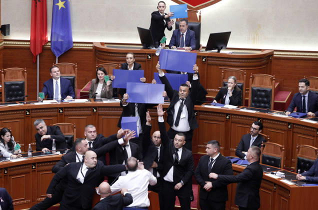 Albanian Parliament Vote the Territorial Reform in Tirana, Albania. Bodyguards try to protect Albanian Prime Minister Edi Rama (C) as an opposition MP throws a water bottle during a parliamentary session where a government s proposed administrative and territorial reform is voted on in Tirana, Albania, early on October 9, 2026. Light Studio Agency Malton Dibra Tirana Albania Copyright: xLightxStudioxAgencyx xMaltonxDibrax