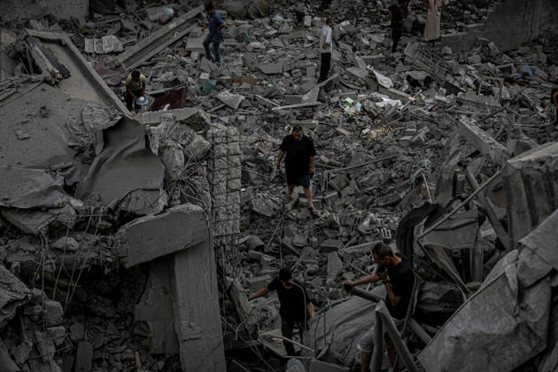 Israeli army continues its attacks on Gaza despite the ceasefire GAZA CITY, PALESTINE - OCTOBER 9: Palestinian civilians and emergency responders search through the debris of damaged residential buildings following an Israeli military airstrike in the Sabra neighborhood, south of Gaza City, Palestine on October 9, 2026. Multiple dead and wounded, including women and children, were reported as rescue teams worked under severe resource shortages to extract survivors from beneath destroyed structures. Saeed M. M. T. Jaras Anadolu Gaza City Gaza. Editorial use only. Please get in touch for any other usage.  Copyright: x2026xAnadoluxSaeedxM.xM.xT.xJarasx