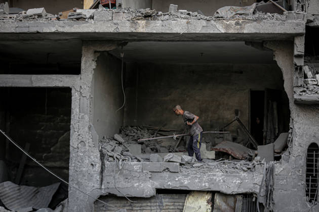 Israeli army continues its attacks on Gaza despite the ceasefire GAZA CITY, PALESTINE - OCTOBER 9: Palestinian civilians and emergency responders search through the debris of damaged residential buildings following an Israeli military airstrike in the Sabra neighborhood, south of Gaza City, Palestine on October 9, 2026. Multiple dead and wounded, including women and children, were reported as rescue teams worked under severe resource shortages to extract survivors from beneath destroyed structures. Saeed M. M. T. Jaras Anadolu Gaza City Gaza. Editorial use only. Please get in touch for any other usage.  Copyright: x2026xAnadoluxSaeedxM.xM.xT.xJarasx