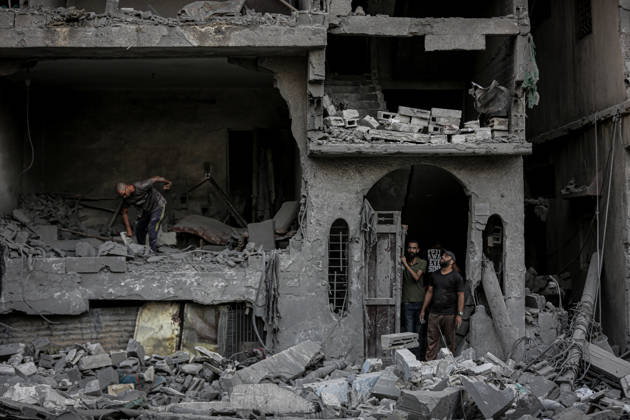 Israeli army continues its attacks on Gaza despite the ceasefire GAZA CITY, PALESTINE - OCTOBER 9: Palestinian civilians and emergency responders search through the debris of damaged residential buildings following an Israeli military airstrike in the Sabra neighborhood, south of Gaza City, Palestine on October 9, 2026. Multiple dead and wounded, including women and children, were reported as rescue teams worked under severe resource shortages to extract survivors from beneath destroyed structures. Saeed M. M. T. Jaras Anadolu Gaza City Gaza. Editorial use only. Please get in touch for any other usage. Copyright: x2026xAnadoluxSaeedxM.xM.xT.xJarasx