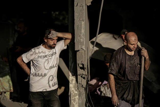 Israeli army continues its attacks on Gaza despite the ceasefire GAZA CITY, PALESTINE - OCTOBER 9: Palestinian civilians and emergency responders search through the debris of damaged residential buildings following an Israeli military airstrike in the Sabra neighborhood, south of Gaza City, Palestine on October 9, 2026. Multiple dead and wounded, including women and children, were reported as rescue teams worked under severe resource shortages to extract survivors from beneath destroyed structures. Saeed M. M. T. Jaras Anadolu Gaza City Gaza. Editorial use only. Please get in touch for any other usage.  Copyright: x2026xAnadoluxSaeedxM.xM.xT.xJarasx
