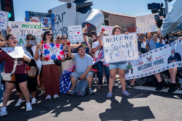 October 8, 2026, Coronado, California, United States: Family members and supporters hold handmade signs and banners welcoming sailors home as the aircraft carrier USS Abraham Lincoln (CVN 72) returns to Naval Air Station North Island in Coronado, California, on October 8, 2026, following a deployment. The signs include personal messages for sailors, including one reading Welcome Home Sarah! and a banner welcoming Aean Ramirez. Coronado United States - ZUMAg374 20261008_znp_g374_014 Copyright: xLoganxGrahamx