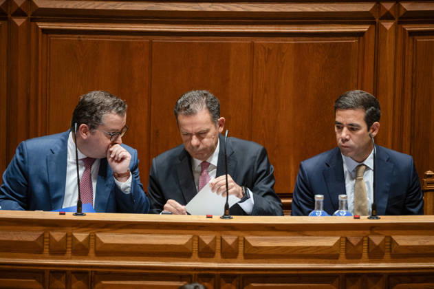 October 9, 2026, Lisbon, Lisbon, Portugal: Portuguese Prime Minister LUIS MONTENEGRO, center, looks over documents on the government bench during the fortnightly parliamentary debate at the Assembleia da Republica in Lisbon, Portugal, on October 9, 2026. The government-accountability session was scheduled to be followed by a debate preparing Portugal s position for the European Council. Lisbon Portugal - ZUMAr238 20261009_zip_r238_002 Copyright: xRicardoxRochax