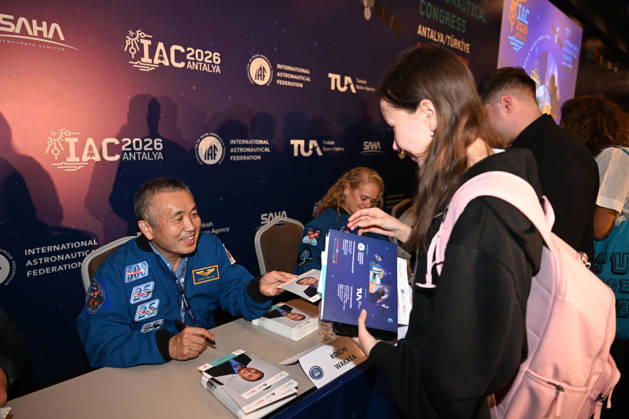 Astronauts meet visitors at autograph session during International Astronautical Congress ANTALYA, TURKIYE - OCTOBER 09: Astronauts from various countries meet visitors during an autograph session on Public Day of the 77th International Astronautical Congress (IAC 2026) at the NEST Congress Center in Antalya, Turkiye, on October 09, 2026. Organized by the International Astronautical Federation (IAF) under the coordination of the Ministry of Industry and Technology and hosted by the Turkish Space Agency (TUA) and SAHA Istanbul, the congress opens its doors to the public on its final day. Muhammed Abdullah Kurtar Anadolu Antalya Turkey. Editorial use only. Please get in touch for any other usage. Copyright: x2026xAnadoluxMuhammedxAbdullahxKurtarx