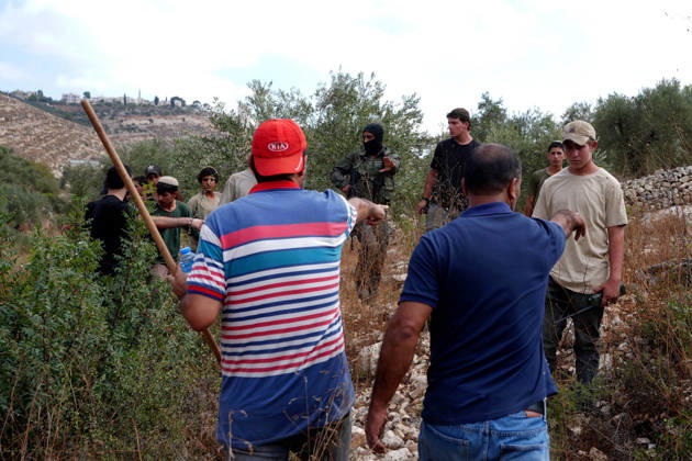 Clashes erupt between Israeli settlers and Palestinian farmers in West Bank RAMALLAH, WEST BANK - OCTOBER 9: Clashes break out between Israeli settlers, accompanied by Israeli soldiers, and Palestinian farmers harvesting olives in the town of Deir Ibzi, near Ramallah in West Bank, on October 9, 2026. The incident reportedly involved damage to olive crops and provocative actions by the settlers. Issam Rimawi Anadolu West Bank Palestine. Editorial use only. Please get in touch for any other usage. Copyright: x2026xAnadoluxIssamxRimawix