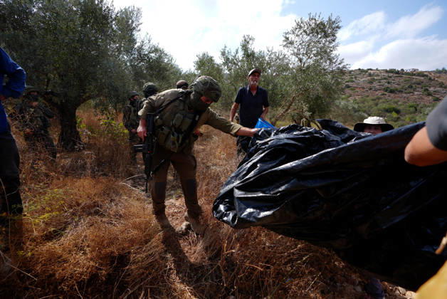 Clashes erupt between Israeli settlers and Palestinian farmers in West Bank RAMALLAH, WEST BANK - OCTOBER 9: Clashes break out between Israeli settlers, accompanied by Israeli soldiers, and Palestinian farmers harvesting olives in the town of Deir Ibzi, near Ramallah in West Bank, on October 9, 2026. The incident reportedly involved damage to olive crops and provocative actions by the settlers. Issam Rimawi Anadolu West Bank Palestine. Editorial use only. Please get in touch for any other usage. Copyright: x2026xAnadoluxIssamxRimawix