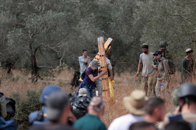 Clashes erupt between Israeli settlers and Palestinian farmers in West Bank RAMALLAH, WEST BANK - OCTOBER 9: Clashes break out between Israeli settlers, accompanied by Israeli soldiers, and Palestinian farmers harvesting olives in the town of Deir Ibzi, near Ramallah in West Bank, on October 9, 2026. The incident reportedly involved damage to olive crops and provocative actions by the settlers. Issam Rimawi Anadolu Ramallah West Bank. Editorial use only. Please get in touch for any other usage. Copyright: x2026xAnadoluxIssamxRimawix