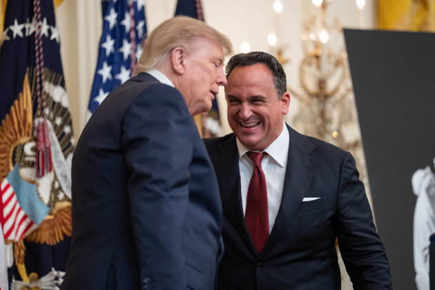President Donald Trump embraces singer Christopher Macchio during an event in the East Room of the White House in Washington, DC on Friday, Oct. 9, 2026. Trump is hosting a Columbus Day celebration.  WASP20261009108 AaronxSchwartz