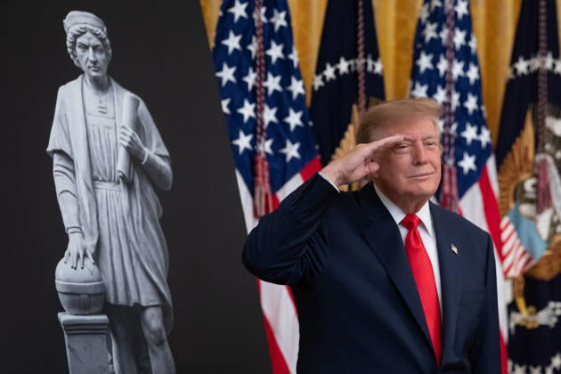 President Donald Trump salutes during the National Anthem during an event in the East Room of the White House in Washington, DC on Friday, Oct. 9, 2026. Trump is hosting a Columbus Day celebration. WASP20261009113 AaronxSchwartz