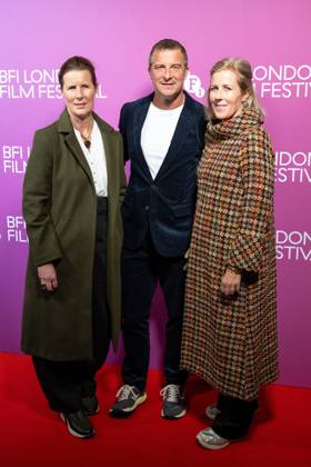October 9, 2026, London, United Kingdom: (L-R), Guest with Bear Grylls (centre) and Shara Grylls attend the In The Shadows Screening during the 70th BFI London Film Festival at Vue West End.Cast and guests attend In The Shadows Screening during the 70th BFI London Film Festival at Vue West End , London London United Kingdom - ZUMAs197 20261009_aaa_s197_098 Copyright: xPhilxLewisx