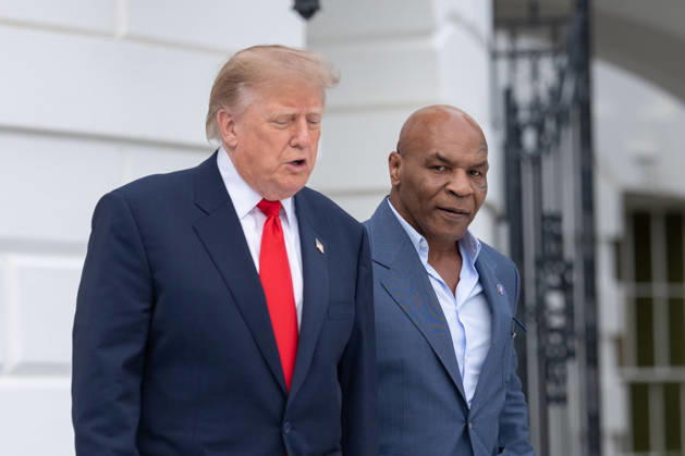 President Donald Trump walks with former professional boxer Mike Tyson on the South Lawn of the White House before boarding Marine One in Washington, DC on Friday, Oct. 9, 2026. Trump is heading to Syracuse on Friday to boost Republican gubernatorial candidate Bruce Blakeman, who is trailing Governor Kathy Hochul in polls ahead of November s election. WASP20261009141 AaronxSchwartz