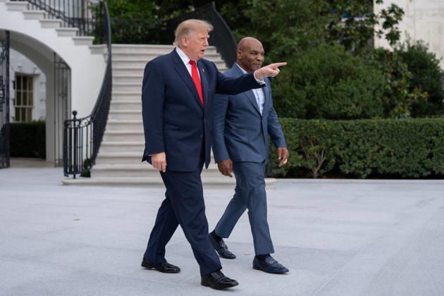 President Donald Trump walks with former professional boxer Mike Tyson on the South Lawn of the White House before boarding Marine One in Washington, DC on Friday, Oct. 9, 2026. Trump is heading to Syracuse on Friday to boost Republican gubernatorial candidate Bruce Blakeman, who is trailing Governor Kathy Hochul in polls ahead of November s election. WASP20261009143 AaronxSchwartz