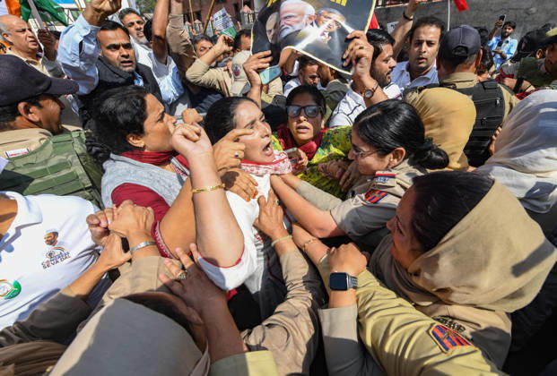 October 10, 2026, Srinagar, Jammu And Kashmir, India: Police personnel try to stop supporters of the opposition alliance INDIA bloc (Indian National Developmental Inclusive Alliance) during a protest demanding the resignation of India s Chief Election Commissioner Gyanesh Kumar over alleged voter roll irregularities linked to the special intensive revision (SIR), in Srinagar on October 10, 2026. Srinagar India  - ZUMAz120 20261010_zip_z120_005 Copyright: xBasitxZargarx