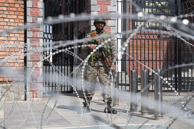 October 10, 2026, Srinagar, Jammu And Kashmir, India: A Paramilitary soldier stands guard outside the congress headquarter during a INDIA bloc protest in Srinagar on October 10, 2026 against the country s Chief Election Commissioner Gyanesh Kumar, calling for his resignation over alleged irregularities in the Special Intensive Revision (SIR) of electoral rolls. Srinagar India  - ZUMAz120 20261010_zip_z120_007 Copyright: xBasitxZargarx