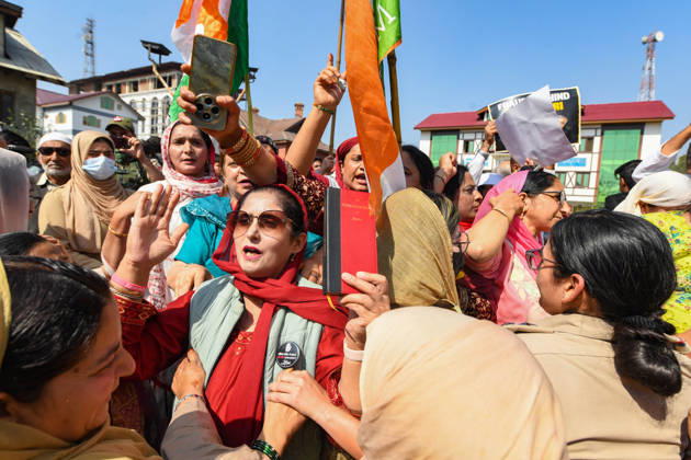 October 10, 2026, Srinagar, Jammu And Kashmir, India: Police personnel try to stop supporters of the opposition alliance INDIA bloc (Indian National Developmental Inclusive Alliance) during a protest demanding the resignation of India s Chief Election Commissioner Gyanesh Kumar over alleged voter roll irregularities linked to the special intensive revision (SIR), in Srinagar on October 10, 2026. Srinagar India  - ZUMAz120 20261010_zip_z120_012 Copyright: xBasitxZargarx