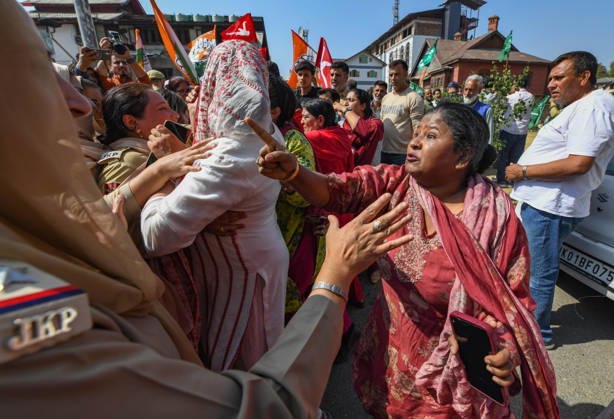 October 10, 2026, Srinagar, Jammu And Kashmir, India: Police personnel try to stop supporters of the opposition alliance INDIA bloc (Indian National Developmental Inclusive Alliance) during a protest demanding the resignation of India s Chief Election Commissioner Gyanesh Kumar over alleged voter roll irregularities linked to the special intensive revision (SIR), in Srinagar on October 10, 2026. Srinagar India  - ZUMAz120 20261010_zip_z120_015 Copyright: xBasitxZargarx