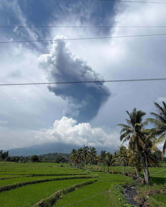 (261010) -- NEGROS ISLAND, Oct. 10, 2026 -- A thick plume is seen over the sky as Mount Kanlaon Volcano erupts in Negros Island, the Philippines, on Oct. 10, 2026. Mount Kanlaon Volcano in the central Philippines erupted just over noon Saturday, the Philippine Institute of Volcanology and Seismology said. The institute said the event generated a plume that rose 5 km to 6 km above the crater. The ashfall is expected to drift north and northeast. ( Handout via Xinhua) PHILIPPINES-NEGROS ISLAND-MOUNT KANLAON VOLCANO-ERUPTION NationalxDisasterxRiskxReductionxandxManagementxCouncil