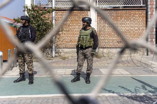 October 10, 2026, Srinagar, Jammu And Kashmir, India: Security forces personnel stand guard outside Congress Bhawan as INDIA bloc alliance partners stage a protest under the Save Democracy Week and Vote Bachao, Desh Bachao campaign, amid row over the resignation of Chief Election Commissioner Gyanesh Kumar in Srinagar, the capital city of Indian Kashmir. Srinagar India  - ZUMAf191 20261010_zip_f191_002 Copyright: xUmarxFarooqx