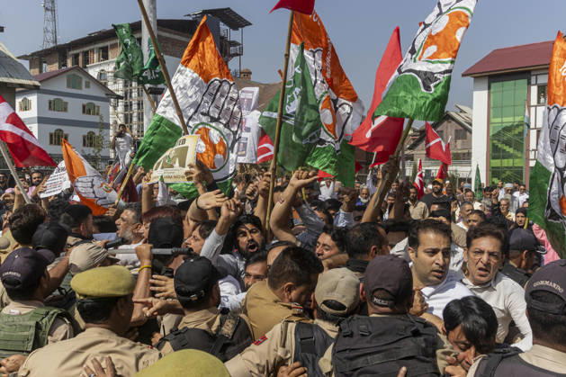 October 10, 2026, Srinagar, Jammu And Kashmir, India: Jammu and Kashmir Police personnel detain supporters of INDIA bloc alliance during a protest under the Save Democracy Week and Vote Bachao, Desh Bachao campaign, amid row over the resignation of Chief Election Commissioner Gyanesh Kumar in Srinagar, the capital city of Indian Kashmir. Srinagar India  - ZUMAf191 20261010_zip_f191_005 Copyright: xUmarxFarooqx