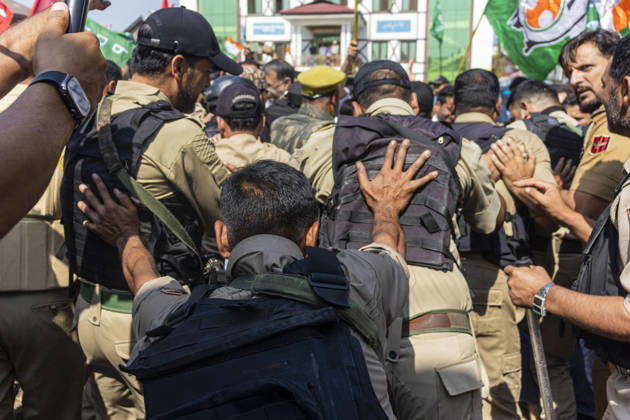October 10, 2026, Srinagar, Jammu And Kashmir, India: A Jammu and Kashmir Police forces personnel pushes towards the supporters of INDIA bloc alliance during a protest under the Save Democracy Week and Vote Bachao, Desh Bachao campaign, amid row over the resignation of Chief Election Commissioner Gyanesh Kumar in Srinagar, the capital city of Indian Kashmir. Srinagar India  - ZUMAf191 20261010_zip_f191_008 Copyright: xUmarxFarooqx