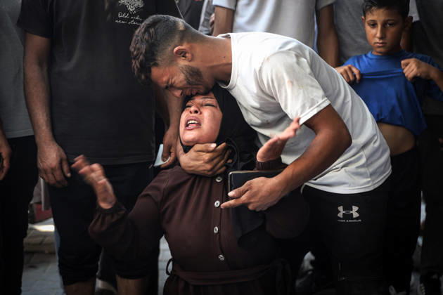 Israeli army continues attacks on Gaza despite ceasefire GAZA CITY, GAZA, PALESTINE - OCTOBER 10: Palestinians mourn after losing their loved ones in an Israeli attack on Gaza City, as Israeli army continues its attacks on the Gaza Strip despite the ceasefire, in Gaza City, Palestine, on October 10, 2026. The bodies of those killed in the attack were brought to Al-Shifa Hospital. Abdalhkem Abu Riash Anadolu Gaza City Gaza. Editorial use only. Please get in touch for any other usage. Copyright: x2026xAnadoluxAbdalhkemxAbuxRiashx