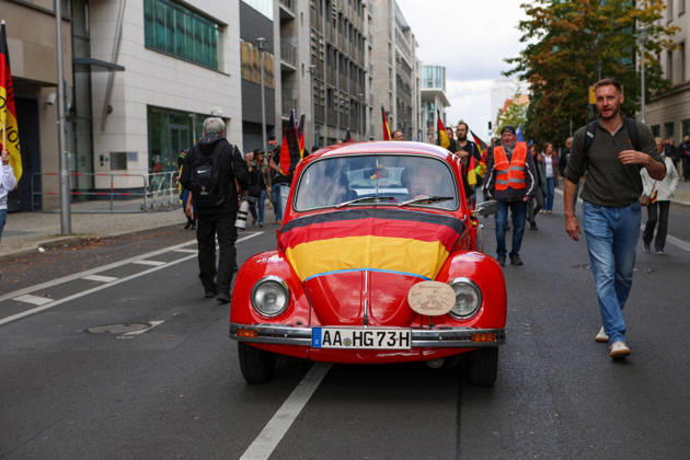 October 10, 2026, Berlin, Berlin, Germany: Demonstrators gather in Berlin for the Project M1llion rally against the German government. Participants take to the streets to voice their opposition to government policies, displaying banners and expressing their political demands. The demonstration brings together people seeking to make their concerns heard and draw public attention to their criticism of the country s political leadership. Berlin Germany - ZUMAc291 20261010_zip_c291_001 Copyright: xMariaxCastrox