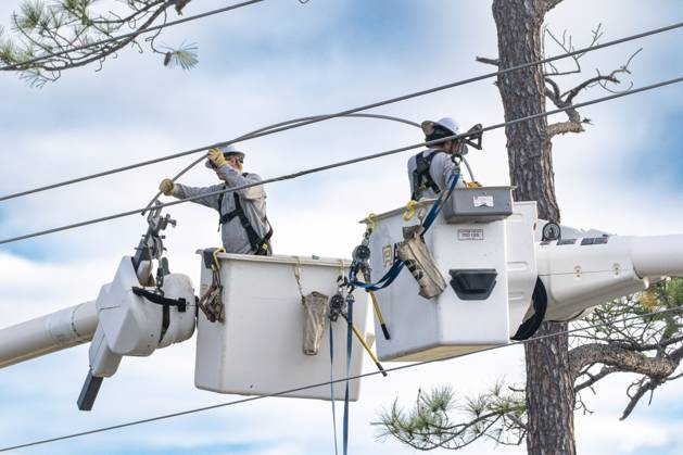 October 10, 2026, Orange Beach, Al, USA: Crews work to repair power lines after a tree fell on them as Hurricane Isaias came ashore..Hurricane Isaias made landfall Friday, October 9 along the U.S. Gulf coast. Orange Beach USA  - ZUMAs197 20261010_aaa_s197_002 Copyright: xJenxGolbeckx