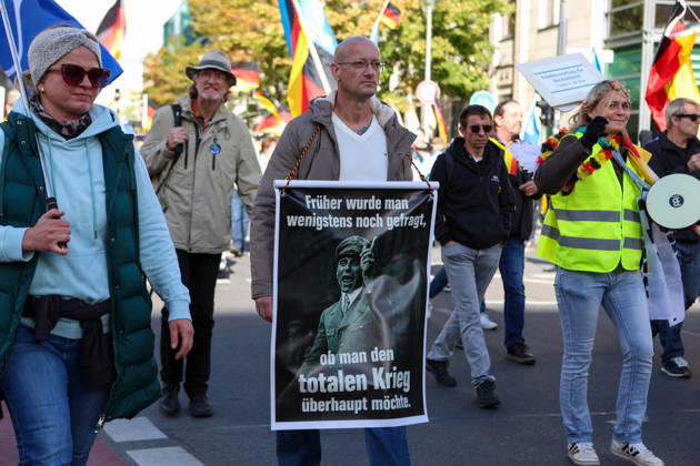 October 10, 2026, Berlin, Berlin, Germany: Demonstrators gather in Berlin for the Project M1llion rally against the German government. Participants take to the streets to voice their opposition to government policies, displaying banners and expressing their political demands. The demonstration brings together people seeking to make their concerns heard and draw public attention to their criticism of the country s political leadership. Berlin Germany - ZUMAc291 20261010_zip_c291_002 Copyright: xMariaxCastrox