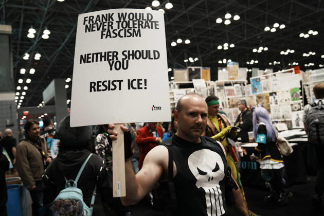 October 10, 2026, New York, New York, USA: A fan of The Punisher holds an anti-fascism and anti-CE sign at the 2026 NY Comic Con at the Javits Center on October 10, 2026 in New York. New York USA  - ZUMAb148 20261010_zap_b148_016 Copyright: xBryanxSmithx