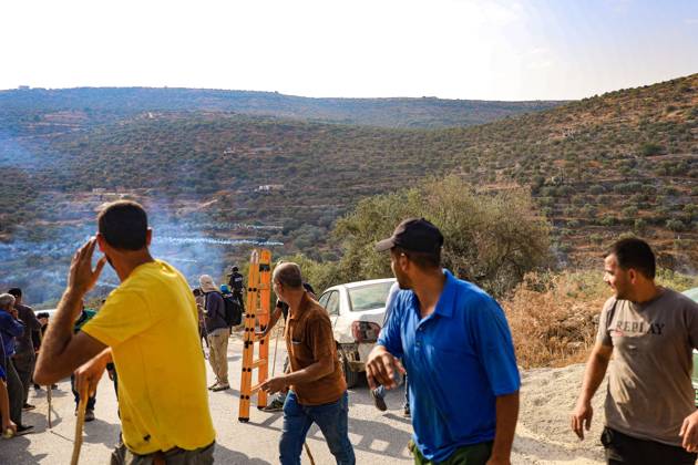 October 10, 2026, Ramallah: DEIR ABU MASHâ€⠢AL, PALESTINE †OCTOBER 10, 2026: Palestinian farmers came under attack by Israeli settlers and Israeli forces as they headed to harvest olives on their land in Deir Abu Mashâ€⠢al, northwest of Ramallah. The event marked the villageâ€⠢s first olive harvest gathering of the new season. The Palestine Red Crescent Society reported that its teams treated nine people injured during the incident. The injuries included one caused by live ammunition to the thigh, two caused by rubber-coated metal bullets, and six resulting from physical assault. One of those struck by a rubber-coated metal bullet was photojournalist Issam Al-Rimawi. The incident occurred during the annual olive harve - ZUMAq101 20261010_zna_q101_057 Copyright: xSalmanxMohsenxAlkhatibx