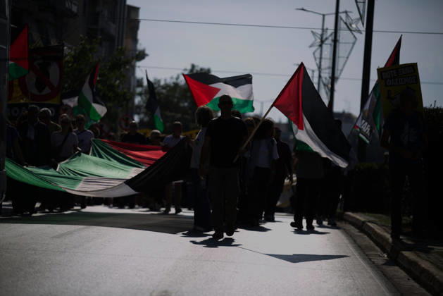 October 10, 2026, Athens, Attica, GREECE: Demonstrators carrying Palestinian flags and a large Palestinian flag-shaped banner march along a city street. Athens GREECE - ZUMAx103 20261010_zip_x103_019 Copyright: xHarrisxXanthopoulosx