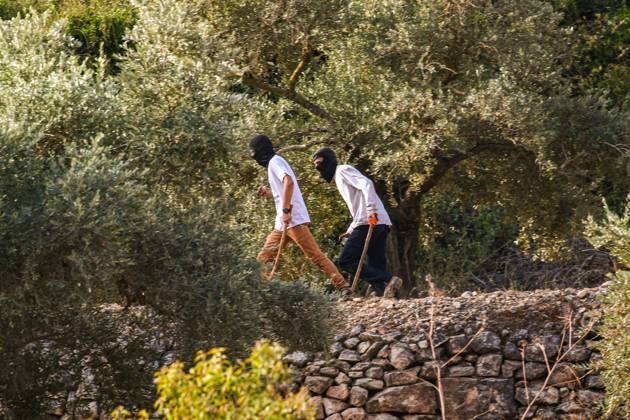 October 10, 2026, Ramallah: DEIR ABU MASHâ€⠢AL, PALESTINE †OCTOBER 10, 2026: Palestinian farmers came under attack by Israeli settlers and Israeli forces as they headed to harvest olives on their land in Deir Abu Mashâ€⠢al, northwest of Ramallah. The event marked the villageâ€⠢s first olive harvest gathering of the new season. The Palestine Red Crescent Society reported that its teams treated nine people injured during the incident. The injuries included one caused by live ammunition to the thigh, two caused by rubber-coated metal bullets, and six resulting from physical assault. One of those struck by a rubber-coated metal bullet was photojournalist Issam Al-Rimawi. The incident occurred during the annual olive harve - ZUMAq101 20261010_zna_q101_063 Copyright: xSalmanxMohsenxAlkhatibx