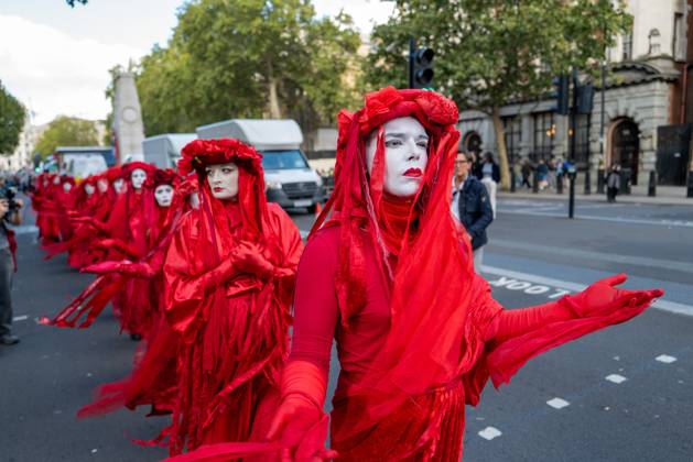 October 10, 2026, London, United Kingdom: Performers from Extinction Rebellion s Red Rebel Brigade stage a silent Walk of Shame procession during the National March for Palestine in London. The National March marks three years since the outbreak of the war in Gaza in October 2023.The National March for Palestine, which was organised by the Palestine Coalition in London. The march marks three years since the outbreak of the war in Gaza in October 2023 London United Kingdom - ZUMAs197 20261010_aaa_s197_065 Copyright: xPhilxLewisx