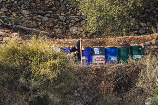 October 10, 2026, Ramallah: DEIR ABU MASHâ€⠢AL, PALESTINE †OCTOBER 10, 2026: Palestinian farmers came under attack by Israeli settlers and Israeli forces as they headed to harvest olives on their land in Deir Abu Mashâ€⠢al, northwest of Ramallah. The event marked the villageâ€⠢s first olive harvest gathering of the new season. The Palestine Red Crescent Society reported that its teams treated nine people injured during the incident. The injuries included one caused by live ammunition to the thigh, two caused by rubber-coated metal bullets, and six resulting from physical assault. One of those struck by a rubber-coated metal bullet was photojournalist Issam Al-Rimawi. The incident occurred during the annual olive harve - ZUMAq101 20261010_zna_q101_067 Copyright: xSalmanxMohsenxAlkhatibx