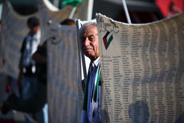 October 10, 2026, Athens, Attica, GREECE: An elderly man stands among banners bearing the names of Palestinians killed in Gaza during a pro-Palestinian demonstration. Athens GREECE - ZUMAx103 20261010_zip_x103_020 Copyright: xHarrisxXanthopoulosx