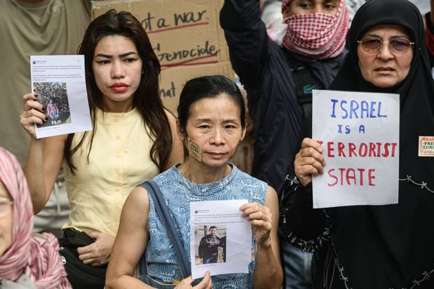 Pro-Palestinian protesters rally in Bangkok BANGKOK, THAILAND, OCTOBER 10, 2026: Pro-Palestinian demonstrators gather outside the Israeli Embassy in Bangkok during a protest marking 1,100 days since the start of the war in Gaza. Participants held portraits of Palestinians killed during the conflict for three minutes in an action titled Every Life Isn t Just a Number, symbolizing three years of war. The demonstration was held as part of a Global Action Day for Palestine. Bangkok Thailand Copyright: x xWatsawatxKoktabtimx xJNAxPressx