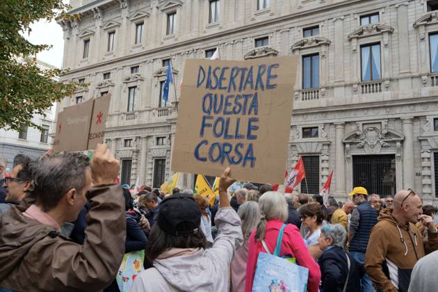 October 7, 2026, Milan, Italy: MILAN, ITALY †OCTOBER 10, 2026: Protesters gather for a sit-in in Piazza della Scala in central Milan to oppose the development of new data centers across Lombardy and Italy. The demonstration is organized by the Rete dei Comitati No Data Center (No Data Center Committee Network), which is calling for a moratorium on permits for new facilities. The group also urges public authorities to conduct thorough environmental, urban planning and regional assessments before approving projects. For approved facilities that have not yet begun operating, campaigners are calling for reviews to be reopened if potential microclimate effects and cumulative impacts with existing facilities were not adequately assessed. - ZUMAq101 20261007_zna_q101_450 Copyright: xCalogeroxRussox