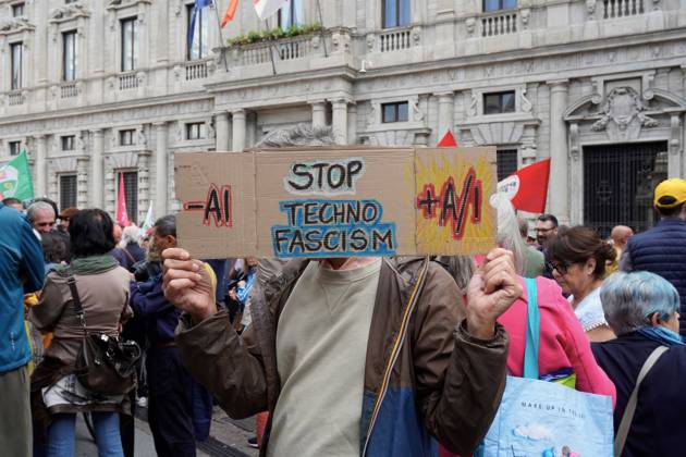 October 10, 2026, Milan, Italy: MILAN, ITALY †OCTOBER 10, 2026: Protesters gather for a sit-in in Piazza della Scala in central Milan to oppose the development of new data centers across Lombardy and Italy. The demonstration is organized by the Rete dei Comitati No Data Center (No Data Center Committee Network), which is calling for a moratorium on permits for new facilities. The group also urges public authorities to conduct thorough environmental, urban planning and regional assessments before approving projects. For approved facilities that have not yet begun operating, campaigners are calling for reviews to be reopened if potential microclimate effects and cumulative impacts with existing facilities were not adequately assessed. - ZUMAq101 20261010_zna_q101_177 Copyright: xCalogeroxRussox