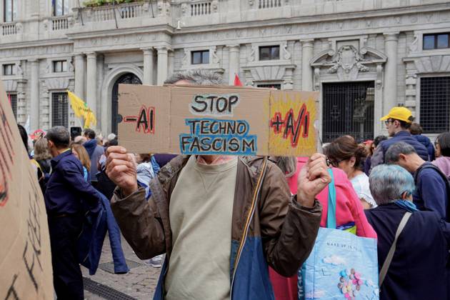 October 10, 2026, Milan, Italy: MILAN, ITALY †OCTOBER 10, 2026: Protesters gather for a sit-in in Piazza della Scala in central Milan to oppose the development of new data centers across Lombardy and Italy. The demonstration is organized by the Rete dei Comitati No Data Center (No Data Center Committee Network), which is calling for a moratorium on permits for new facilities. The group also urges public authorities to conduct thorough environmental, urban planning and regional assessments before approving projects. For approved facilities that have not yet begun operating, campaigners are calling for reviews to be reopened if potential microclimate effects and cumulative impacts with existing facilities were not adequately assessed. - ZUMAq101 20261010_zna_q101_179 Copyright: xCalogeroxRussox