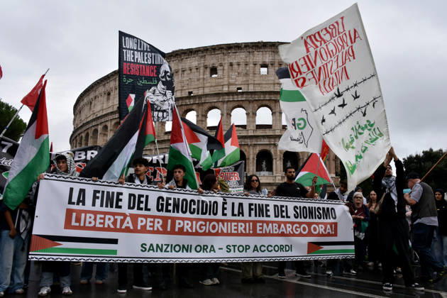 Thousands rally across Italy in support of Palestine ROME, ITALY - OCTOBER 10: Thousands of demonstrators take to the streets to show solidarity with Palestinians and call for an end to the war in Gaza, on October 10, 2026, in Rome, Italy. Demonstrators carrying Palestinian flags march from the Colosseum to Sapienza University despite rainy weather, holding a banner. Baris Seckin Anadolu Rome Italy. Editorial use only. Please get in touch for any other usage.  Copyright: x2026xAnadoluxBarisxSeckinx
