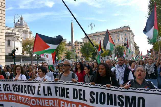 Thousands rally across Italy in support of Palestine ROME, ITALY - OCTOBER 10: Thousands of demonstrators take to the streets to show solidarity with Palestinians and call for an end to the war in Gaza, on October 10, 2026, in Rome, Italy. Demonstrators carrying Palestinian flags march from the Colosseum to Sapienza University despite rainy weather, holding a banner. Baris Seckin Anadolu Rome Italy. Editorial use only. Please get in touch for any other usage.  Copyright: x2026xAnadoluxBarisxSeckinx