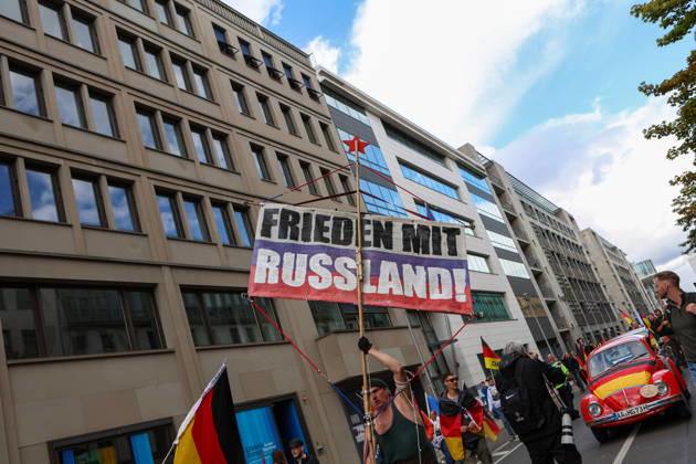 October 10, 2026, Berlin, Berlin, Germany: Demonstrators gather in Berlin for the Project M1llion rally against the German government. Participants take to the streets to voice their opposition to government policies, displaying banners and expressing their political demands. The demonstration brings together people seeking to make their concerns heard and draw public attention to their criticism of the country s political leadership. Berlin Germany - ZUMAc291 20261010_zip_c291_008 Copyright: xMariaxCastrox