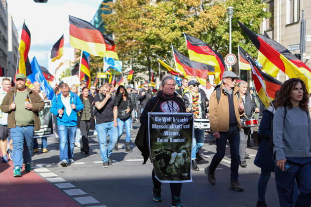 October 10, 2026, Berlin, Berlin, Germany: Demonstrators gather in Berlin for the Project M1llion rally against the German government. Participants take to the streets to voice their opposition to government policies, displaying banners and expressing their political demands. The demonstration brings together people seeking to make their concerns heard and draw public attention to their criticism of the country s political leadership. Berlin Germany - ZUMAc291 20261010_zip_c291_013 Copyright: xMariaxCastrox